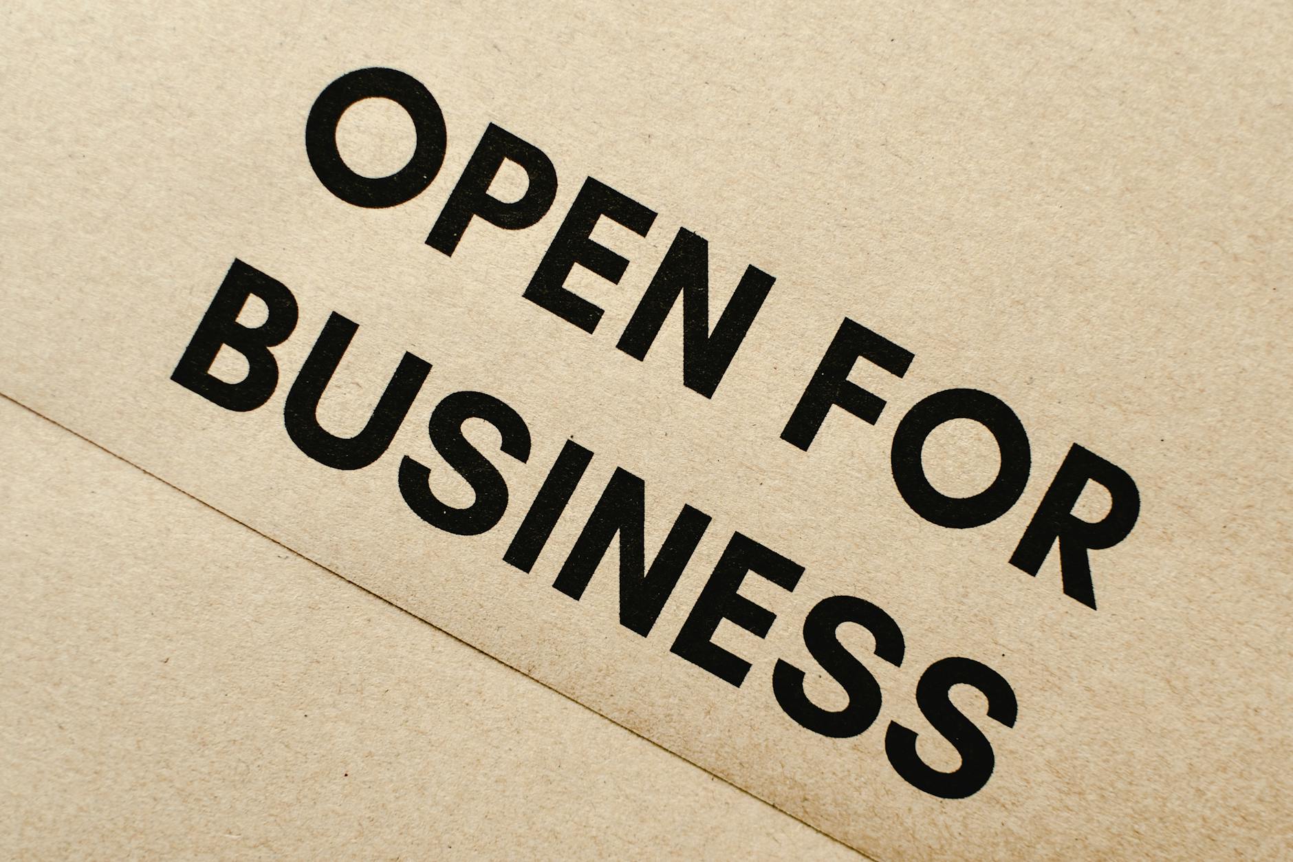 close up shot of an open for business text on an envelope